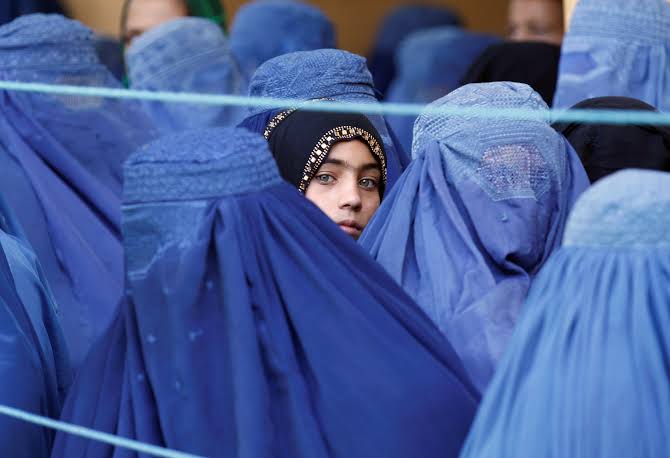 Taliban’s new law bans women from singing or reading in public